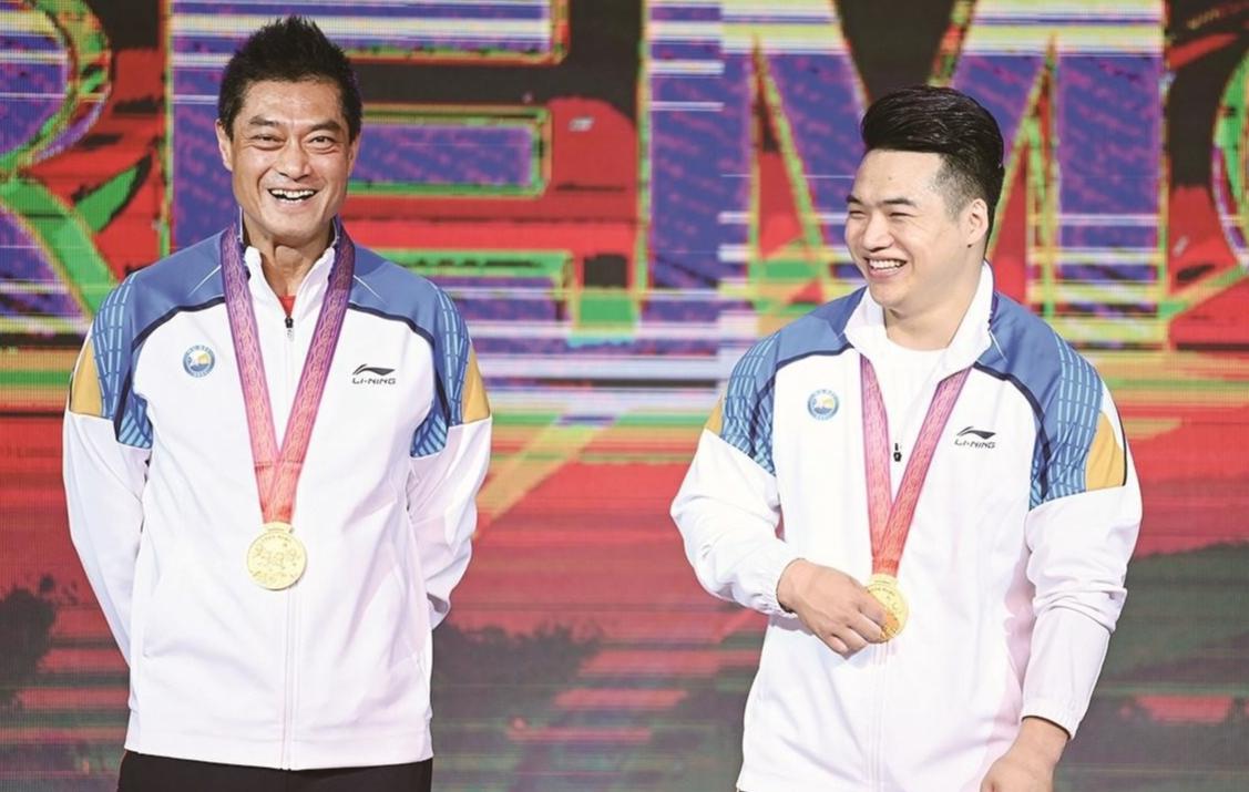 金牌教练于杰，他曾培养出了廖辉、吕小军和龙清泉三位奥运冠军(23)